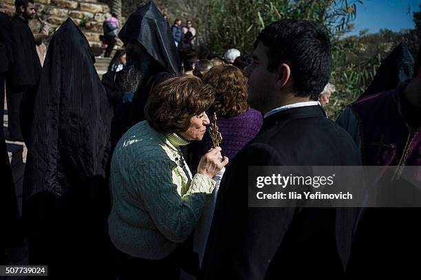 Members of Armenian church of Jerusalem and Armenian pilgrims make a pilgrimage to the baptism site for the Epiphany ceremony on January 31, 2016 in...