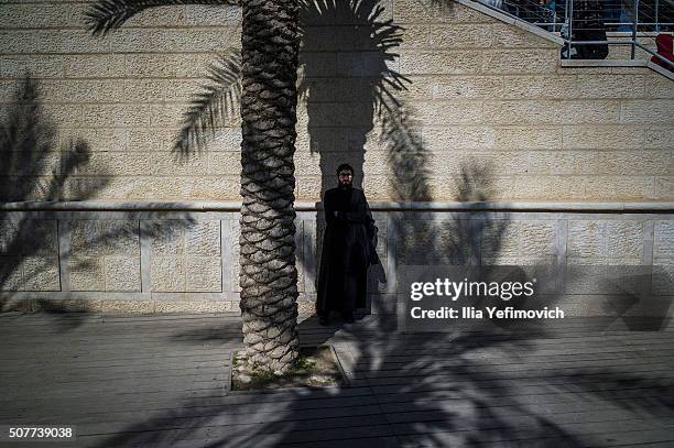 Members of Armenian church of Jerusalem and Armenian pilgrims make a pilgrimage to the baptism site for the Epiphany ceremony on January 31, 2016 in...