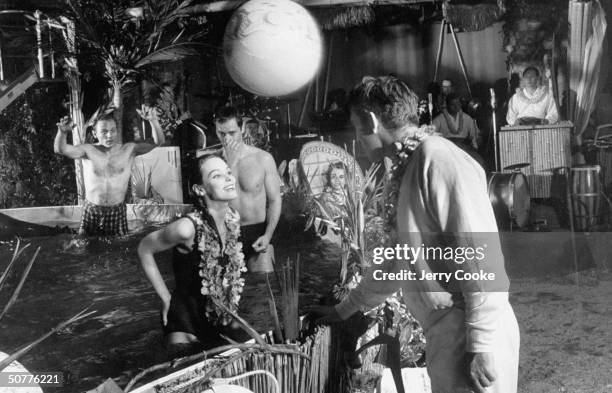 Actor Richard Burton talking with actress Susan Strasberg at a party he threw at the Hawiian Room.