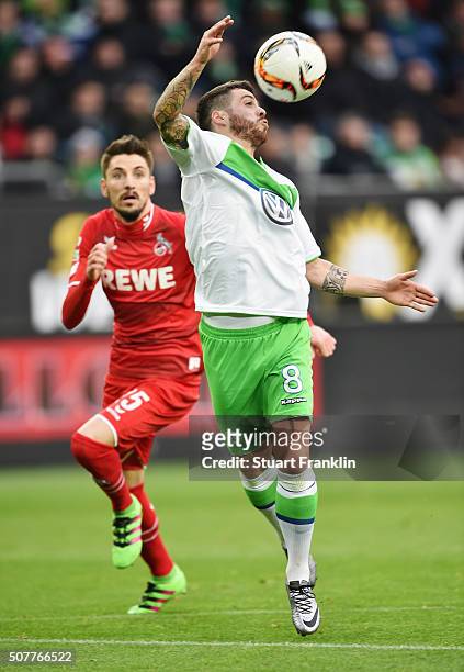 Vierinha of VfL Wolfsburg controls the ball from Filip Mladenovic of Cologne during the Bundesliga match between VfL Wolfsburg and 1. FC Koeln at...