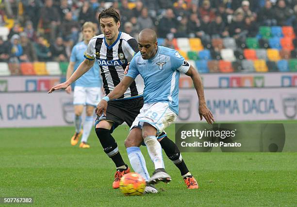 Zdravko Kuzmanovic of Udinese Calcio competes with Abdoulay Konko of SS Lazio during the Serie A match between Udinese Calcio and SS Lazio at Dacia...