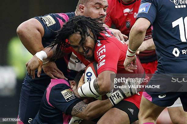 Toulon's New Zealand centre Maa Nonu is tackled during the French Top 14 rugby union match Toulon vs Stade Français on January 31, 2016 at the...