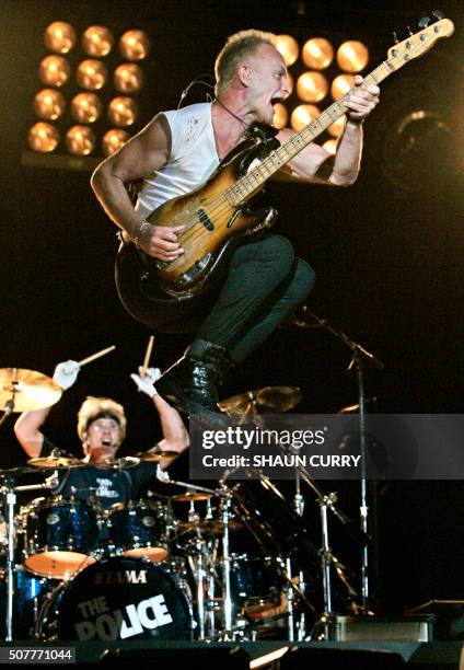 Sting, lead singer of the British rock band The Police and drummer Stuart Copeland perform at the Twickenham stadium, west of London as part of their...