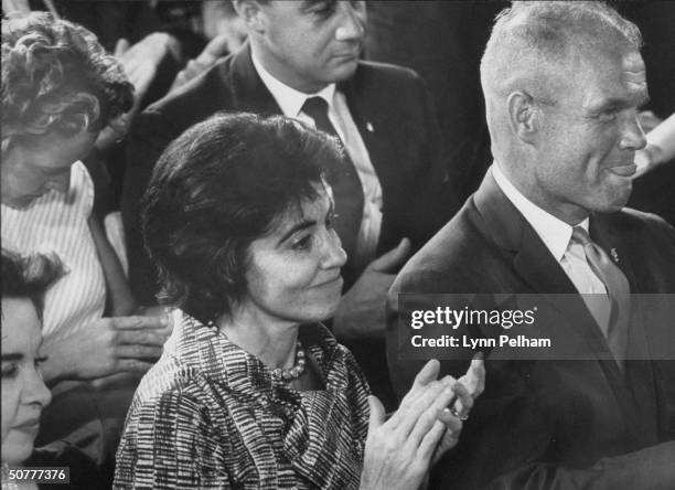 Gus Grissom and John Glenn with wife Annie at Scott Carpenter's press conference.