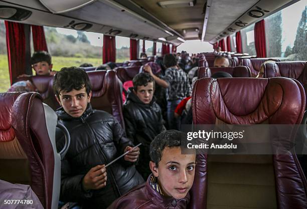 Turkmen families, fled from their homes due to Russian and Assad Regime forces attacks to Turkmen villages in Lattakia, arrive Yayladagi YIBO camp in...