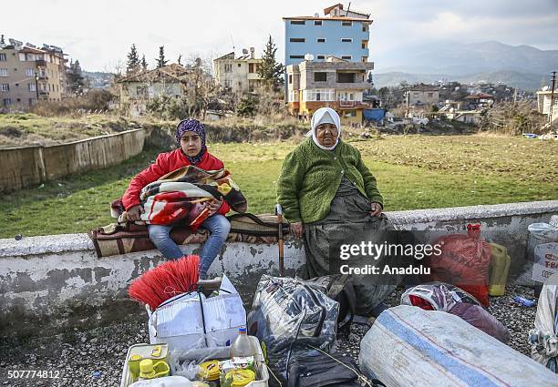 Turkmen families, fled from their homes due to Russian and Assad Regime forces attacks to Turkmen villages in Lattakia, arrive Yayladagi YIBO camp in...