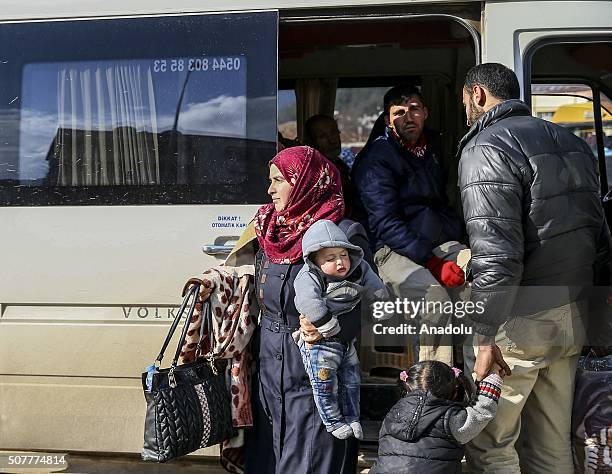 Turkmen families, fled from their homes due to Russian and Assad Regime forces attacks to Turkmen villages in Lattakia, arrive Yayladagi YIBO camp in...