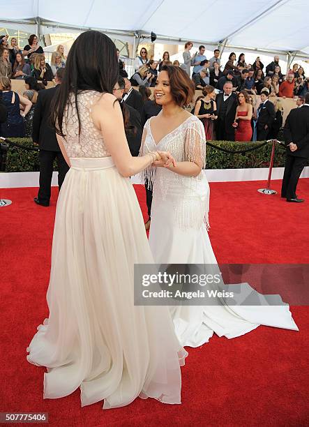 Actresses Dascha Polanco and Laura Prepon attend the 22nd Annual Screen Actors Guild Awards at The Shrine Auditorium on January 30, 2016 in Los...