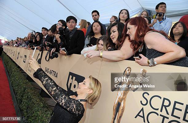 Executive VP Gabrielle Carteris poses for a 'selfie' with fans at the 22nd Annual Screen Actors Guild Awards at The Shrine Auditorium on January 30,...