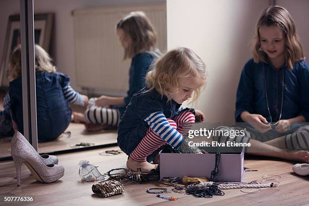 children playing with jewellery box - adult imitation fotografías e imágenes de stock