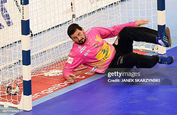 Spain's goalkeeper Arpad Sterbik vies looks at the ball in his net during the final match of the Men's 2016 EHF European Handball Championship...