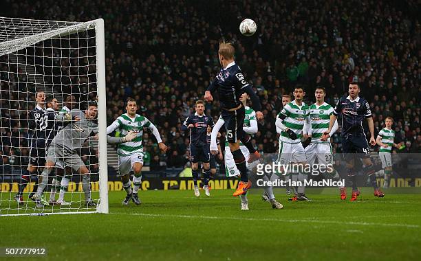 Alex Schalk of Ross County vies with Craig Gordon of Celtic whilst Andrew Davies of Ross County heads the ball back into the box during the Scottish...