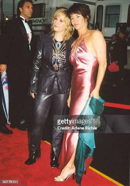 Singer Melissa Etheridge w. Partner Julie Cypher at American Music Awards.