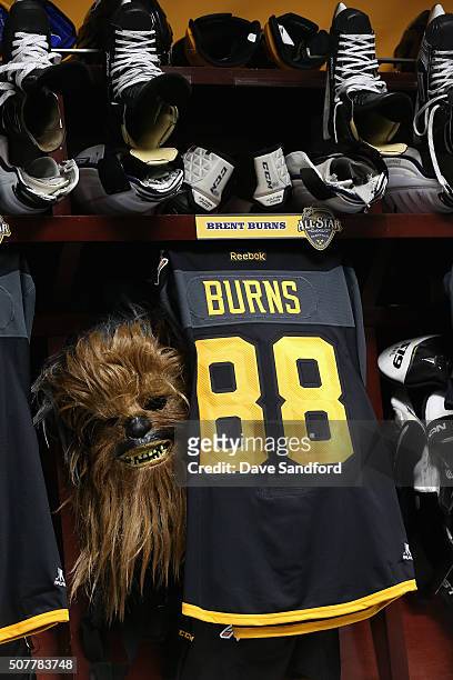 The locker stall of Brent Burns of the San Jose Sharks is seen with his Chewbacca mask in the Western Conference locker room before the 2016 Honda...