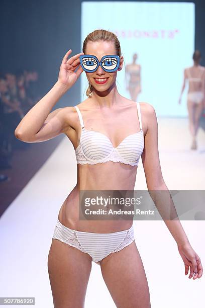 Model walks the runway at the Passionata show as part of Platform Fashion Selected during Platform Fashion January 2016 at Areal Boehler on January...