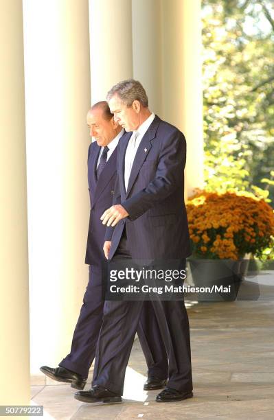 Visiting Italian Prime Minister Silvio Berlusconi and President Bush en route to Oval Office at the White House.