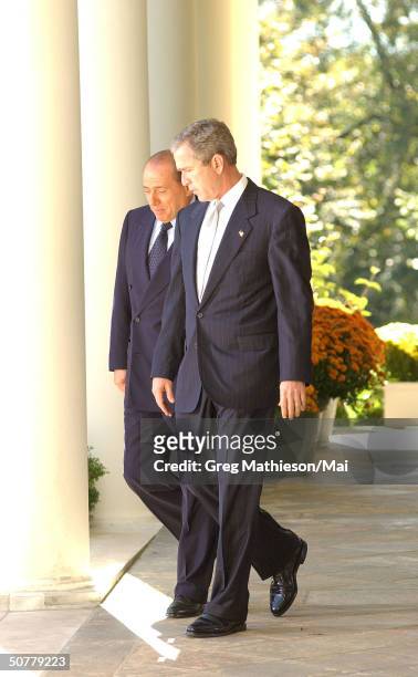 Visiting Italian Prime Minister Silvio Berlusconi and President Bush en route to Oval Office at the White House.