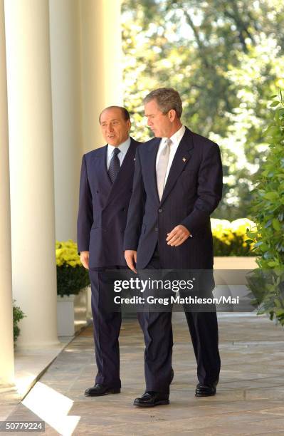 Visiting Italian Prime Minister Silvio Berlusconi and President Bush en route to Oval Office at the White House.
