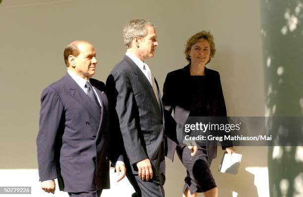 Visiting Italian Prime Minister Silvio Berlusconi and President Bush at the White House.