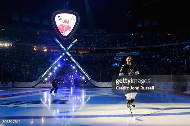 John Scott of the Arizona Coyotes takes the ice during player introductions prior to the 2016 Honda NHL All-Star Game at Bridgestone Arena on January...