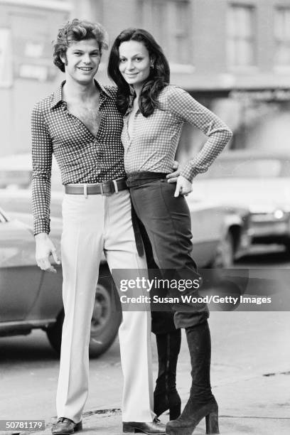 Portrait of of fashion designer Diane von Furstenberg and her husband, Austrian prince Egon von Furstenberg, standing in a city street, 1970s.