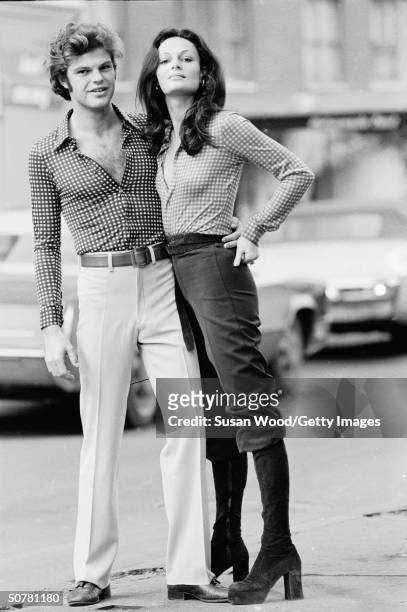 Portrait of of fashion designer Diane von Furstenberg and her husband, Austrian prince Egon von Furstenberg, standing in a city street, 1970s.