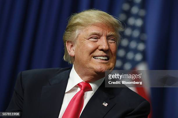 Donald Trump, president and chief executive of Trump Organization Inc. And 2016 Republican presidential candidate, smiles during a campaign rally at...