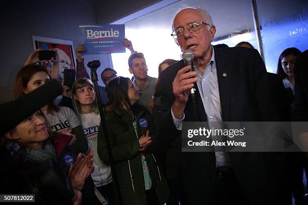 Democratic presidential candidate Sen. Bernie Sanders speaks to campaign volunteers at campaign headquarters January 31, 2016 in Marshalltown, Iowa....