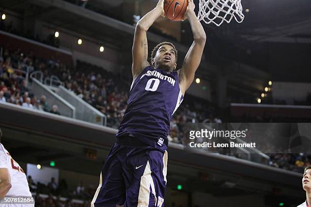 Marquese Chriss of the Washington Huskies goes for a dunk against the USC Trojans during a NCAA college basketball game at Galen Center on January...