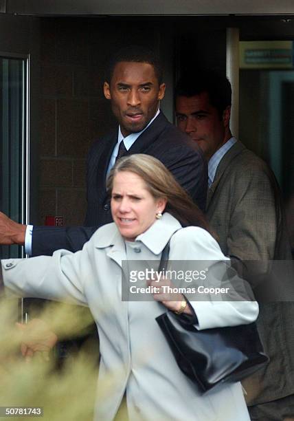 Los Angeles Lakers basketbal player Kobe Byrant leaves the Eagle County Justice Center with his attorney Pamela Mackey after hearings on April 28,...