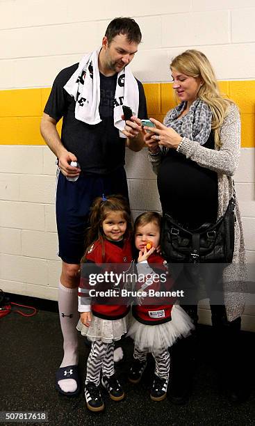 John Scott of the Arizona Coyotes talks with wife Danielle Scott after the 2016 Honda NHL All-Star Final Game between the Eastern Conference and the...