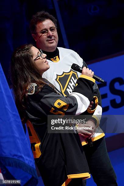 Corrina Grant Gill and Vince Gill perform The Star-Spangled Banner during The 2016 NHL All-Star Game on January 31, 2016 in Nashville, Tennessee.