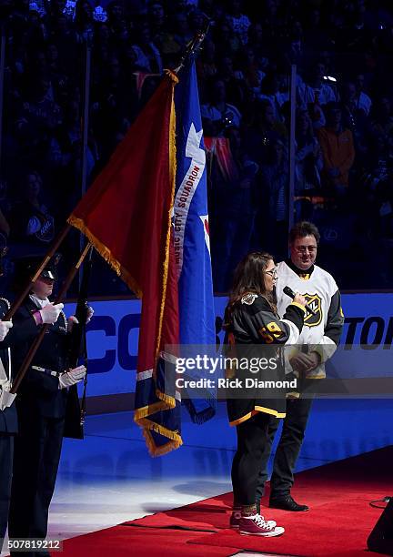 Corrina Grant Gill and Vince Gill perform The Star-Spangled Banner during The 2016 NHL All-Star Game on January 31, 2016 in Nashville, Tennessee.