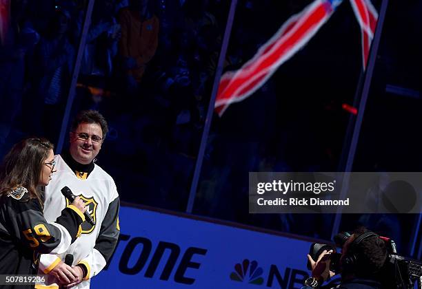 Corrina Grant Gill and Vince Gill perform The Star-Spangled Banner during The 2016 NHL All-Star Game on January 31, 2016 in Nashville, Tennessee.