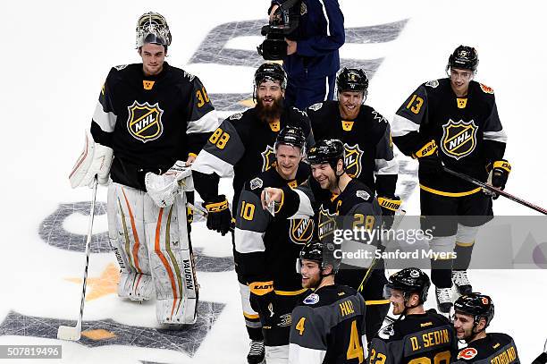 The Pacific Division All-Stars celebrate defeating the Atlantic Division All-Stars in the 2016 Honda NHL All-Star Final Game between the Eastern...