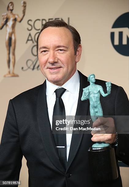 Actor Kevin Spacey winner of Outstanding Performance By a Male Actor in a Drama Series for 'House of Cards,' poses in the press room at the 22nd...