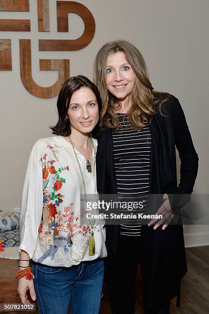 Tal Rabinowitz and actress Sarah Chalke attend the DEN Meditation Studio grand opening on January 31, 2016 in Los Angeles, California.