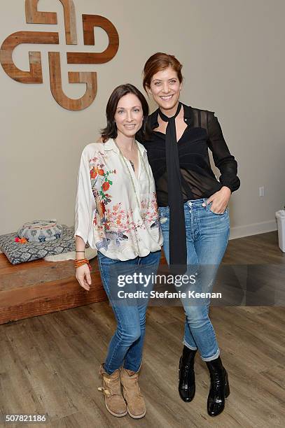 Tal Rabinowitz and actress Kate Walsh attend the DEN Meditation Studio grand opening on January 31, 2016 in Los Angeles, California.