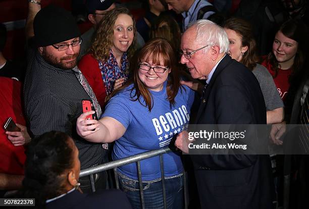 SDemocratic presidential candidate Sen. Bernie Sanders greets voters during a campaign event at Grand View University January 31, 2016 in Des Moines,...