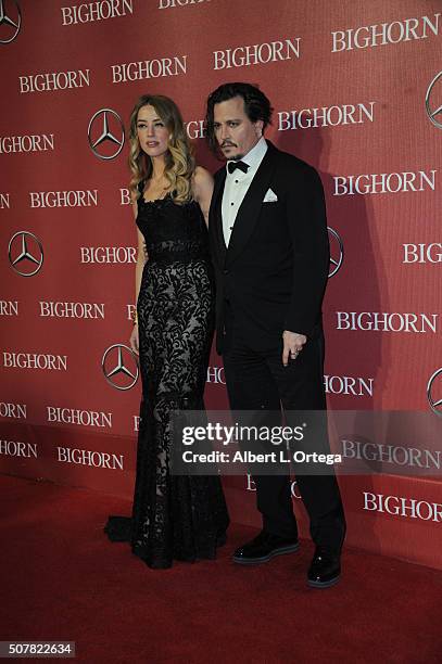 Actress Amber Heard and actor Johnny Depp arrive for the 27th Annual Palm Springs International Film Festival Awards Gala held at Palm Springs...