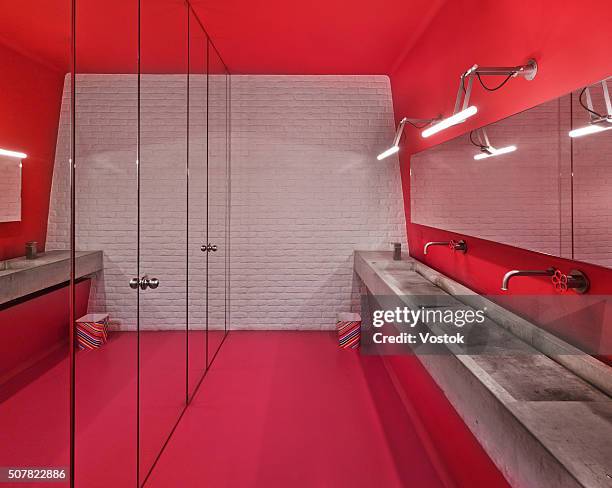 rest room in office - office bathroom stock-fotos und bilder