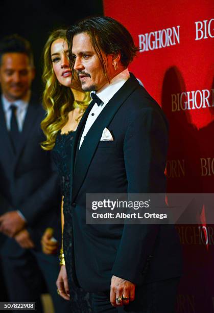 Actress Amber Heard and actor Johnny Depp arrive for the 27th Annual Palm Springs International Film Festival Awards Gala held at Palm Springs...