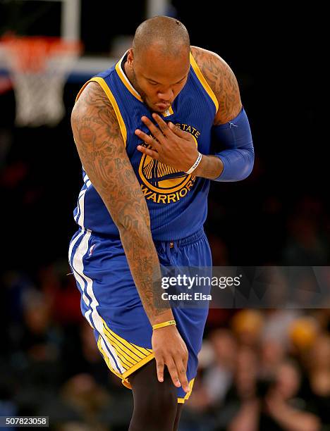 Marreese Speights of the Golden State Warriors celebrates his three point shot in the second half against the New York Knicks at Madison Square...