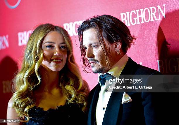 Actress Amber Heard and actor Johnny Depp arrive for the 27th Annual Palm Springs International Film Festival Awards Gala held at Palm Springs...