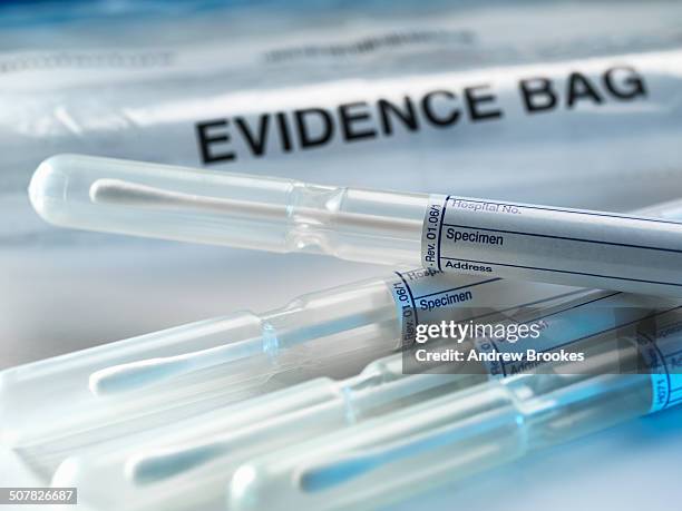 a row of samples from a crime scene on top of genetic testing results - future proof stock pictures, royalty-free photos & images