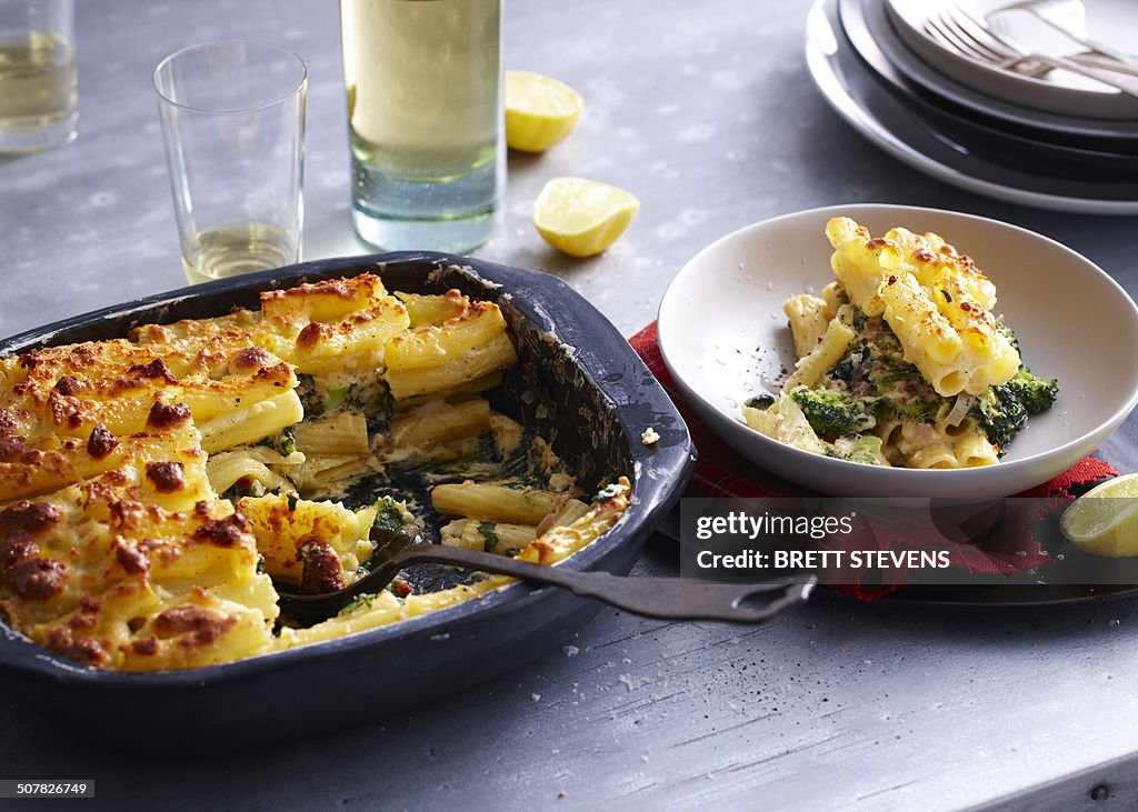 Baking tin and bowl serving of pasticcio
