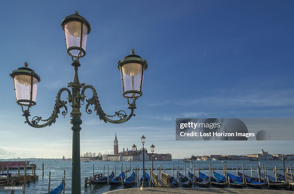 Gondolas and the Island of San Giorgio Maggiore, from St Mark's Square, Venice, Veneto, Italy