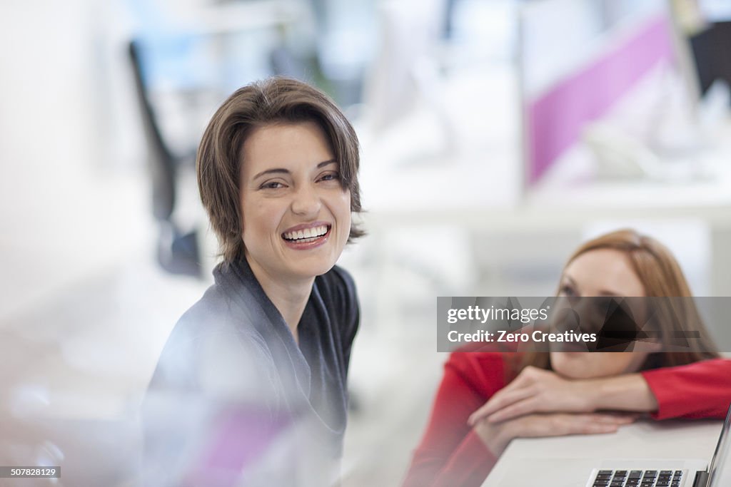 Female office worker smiling