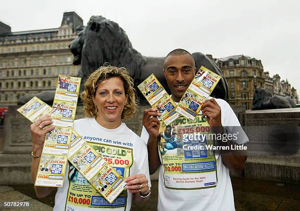Former athletes Sally Gunnell and Colin Jackson help launch a new British Olympic Association 'Olympic Gold' Scratchcard in Trafalgar Square on April...
