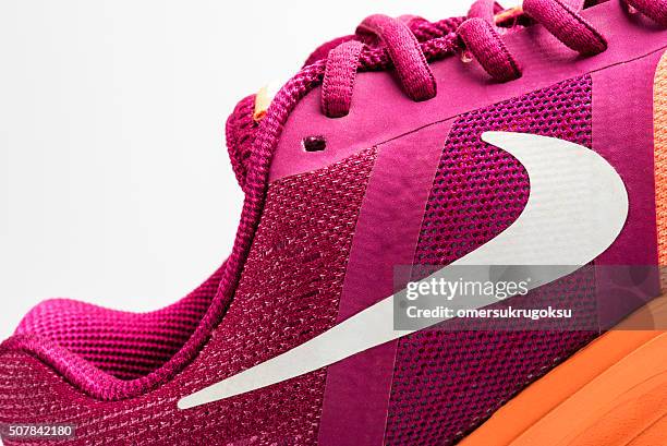 nike pegasus design shoe and logo - nike shoes stock pictures, royalty-free photos & images